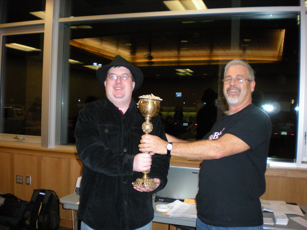 Mike Frentz receives trophy from Tournament Director John Aitken