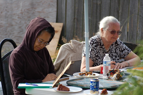 Midori Howard and Alice Goodwin playing Scrabble at Mark Peltier's