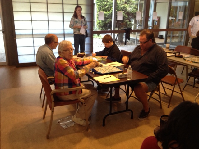 Karen Powell watches Norm Garvin and Ian Sjöholm, with Jane Jackson and Byron Nelson in foreground